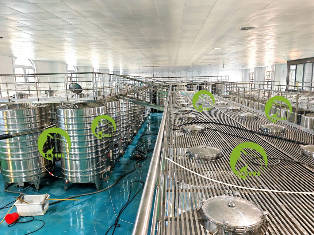 wine fermentation tanks with catwalk