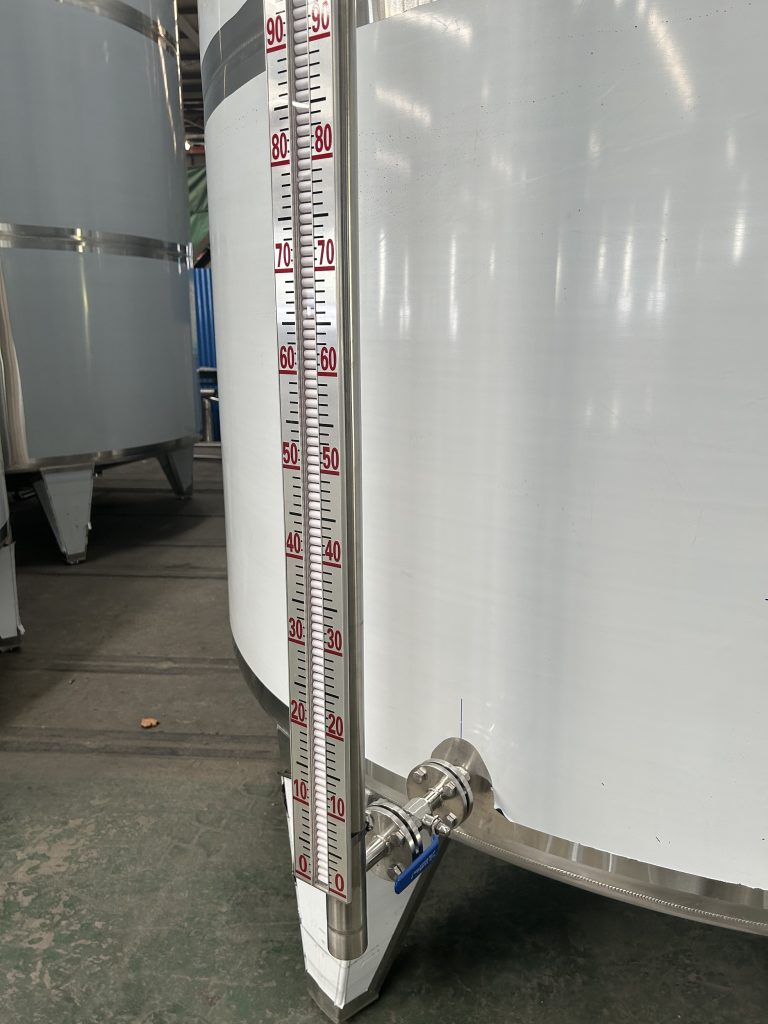 Magnetic flap level gauge for alcohol storage tanks