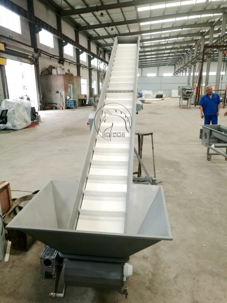 Scraper elevator for wine processing equipment